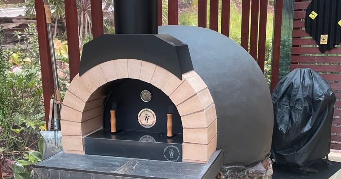Modern backyard wood fired oven with black render